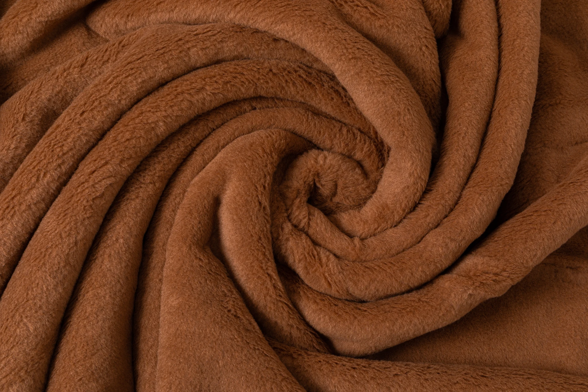 Nahaufnahme der Kamelhaar-Textur einer somne Bettdecke